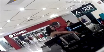 Câmera de segurança do Shopping Iguatemi, em Campinas, flagra mulher furtando iPhone.