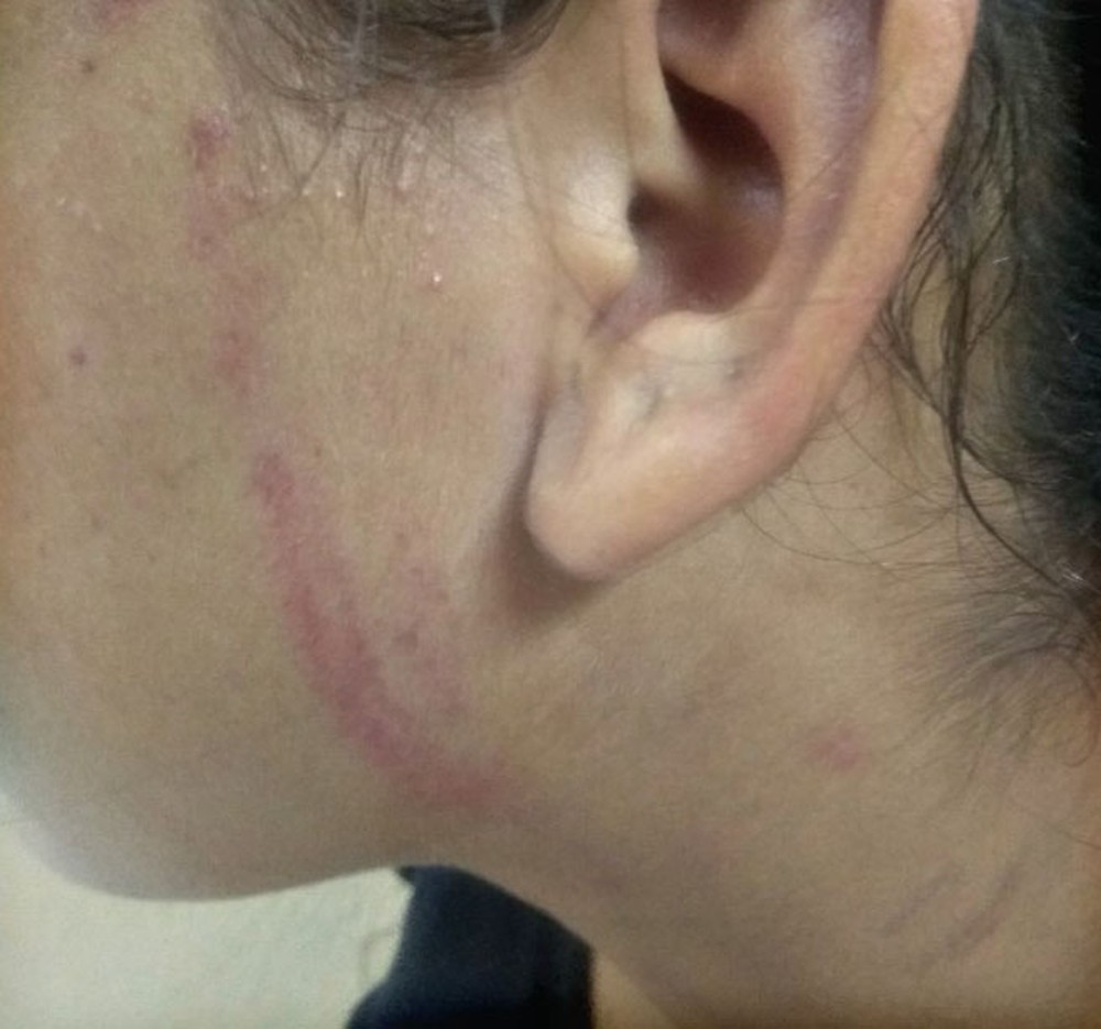 Homem é detido após espancar filha com socos e pedaço de fio elétrico